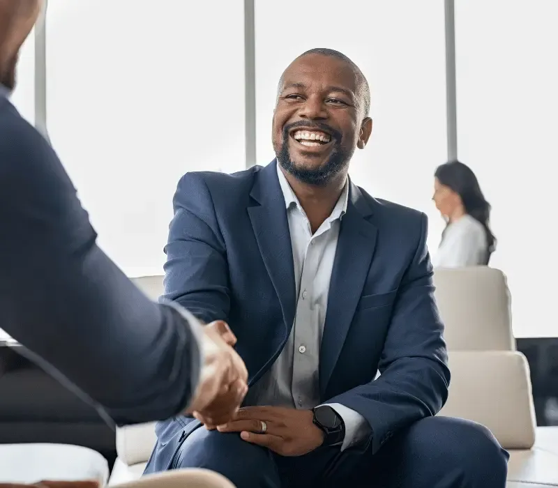 A job seeker smiling during an interview