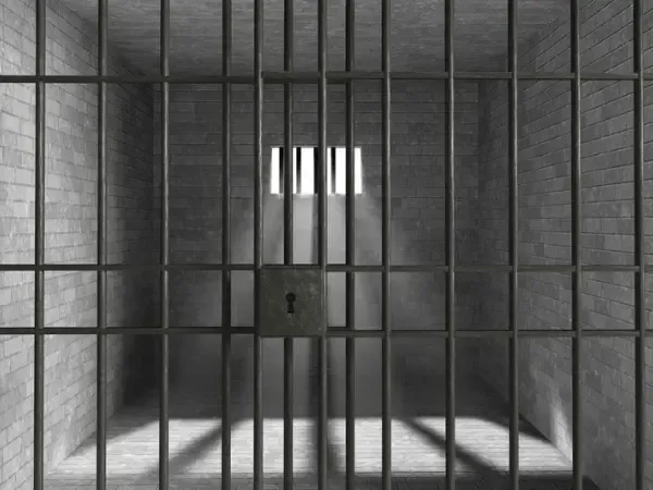 Barred window on a detention facility wall