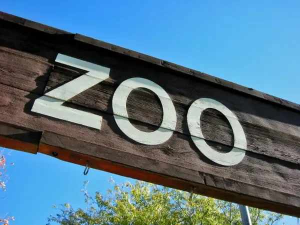 Wooden zoo entrance sign